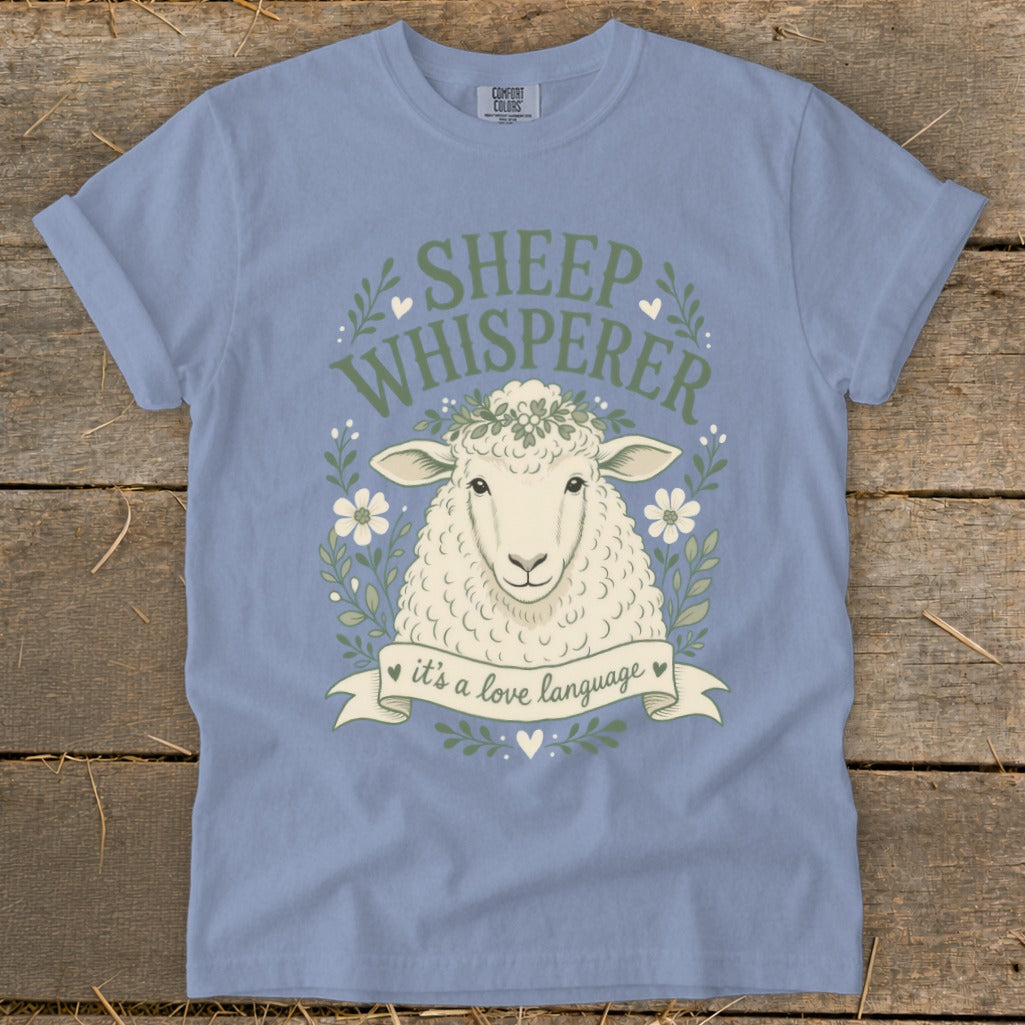 Sheep Whisperer t-shirt with a sheep graphic and text: "it's a love language."