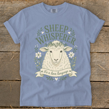 Sheep Whisperer t-shirt with a sheep graphic and text: "it's a love language."