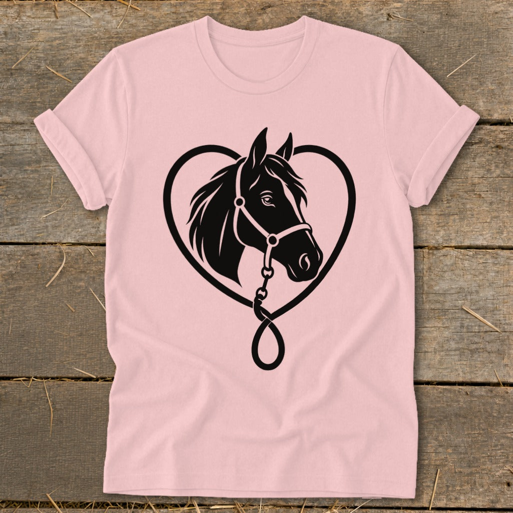 A light pink t-shirt displays a black graphic of a horse framed by a heart-shaped lead rope.
