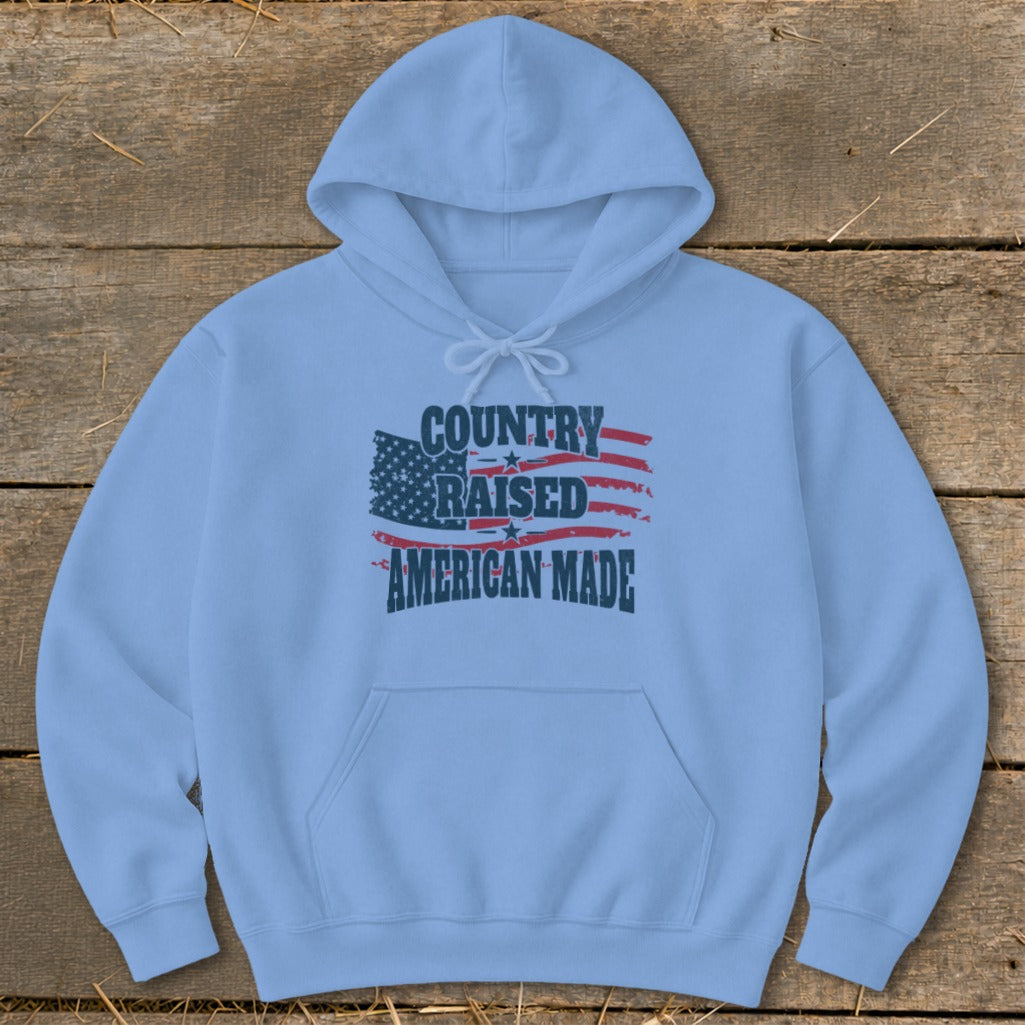 Light blue hoodie with "Country Raised American Made" text and American flag graphic.