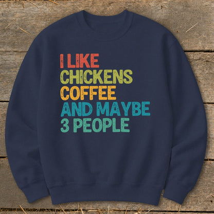 Dark blue sweatshirt with "I like chickens, coffee, and maybe 3 people" text.