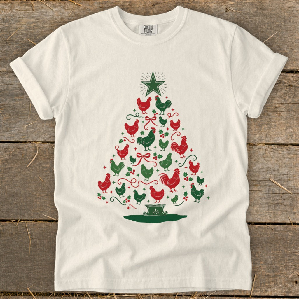 Cream t-shirt with a Christmas tree made of red and green chickens and holly.