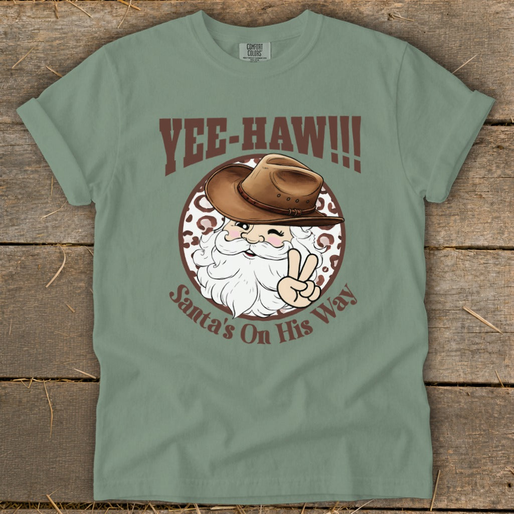 Yee-haw! Santa's on his way shirt with cowboy hat and peace sign.