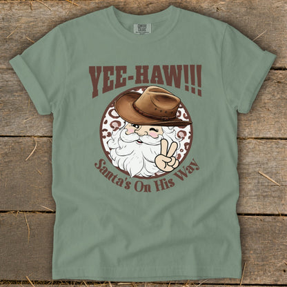 Yee-haw! Santa's on his way shirt with cowboy hat and peace sign.