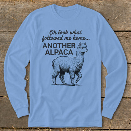 Light blue long-sleeve shirt with an alpaca illustration and text.