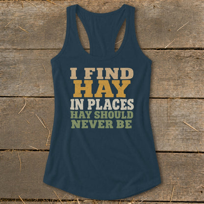 Navy tank top with "I FIND HAY IN PLACES HAY SHOULD NEVER BE" text.