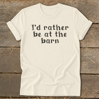 Cream t-shirt with "I'd rather be at the barn" text in black lettering.