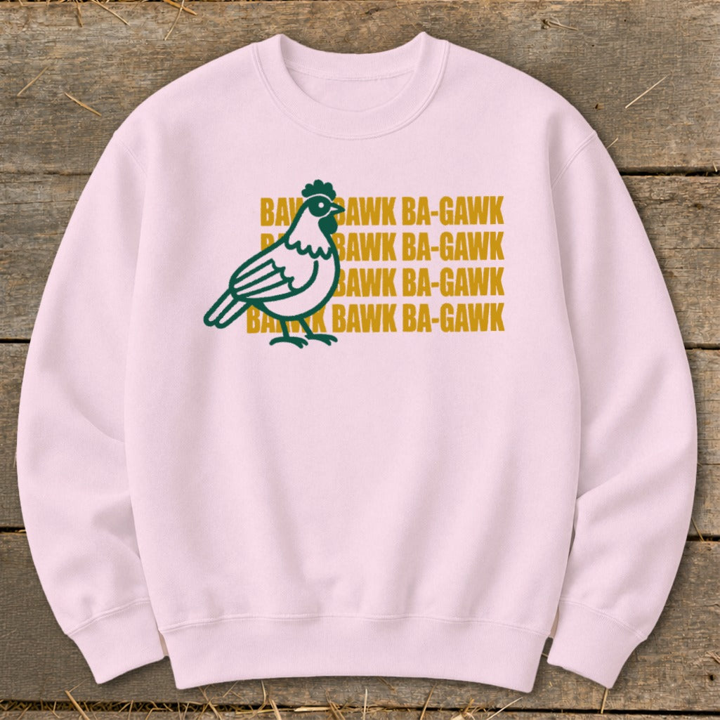 Pink sweatshirt with green chicken graphic and "Bawk Ba-Gawk" text.