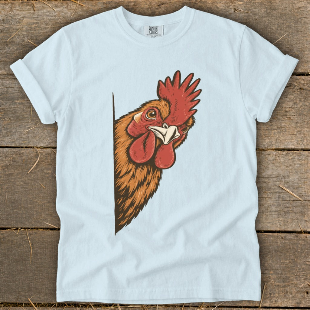 Light blue t-shirt featuring a rooster peeking from the side.