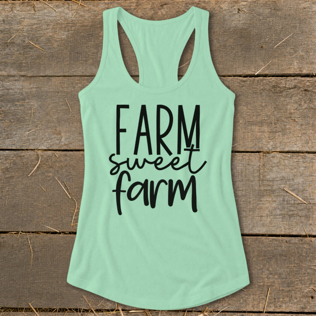 Light green tank top with "FARM sweet farm" text in black.