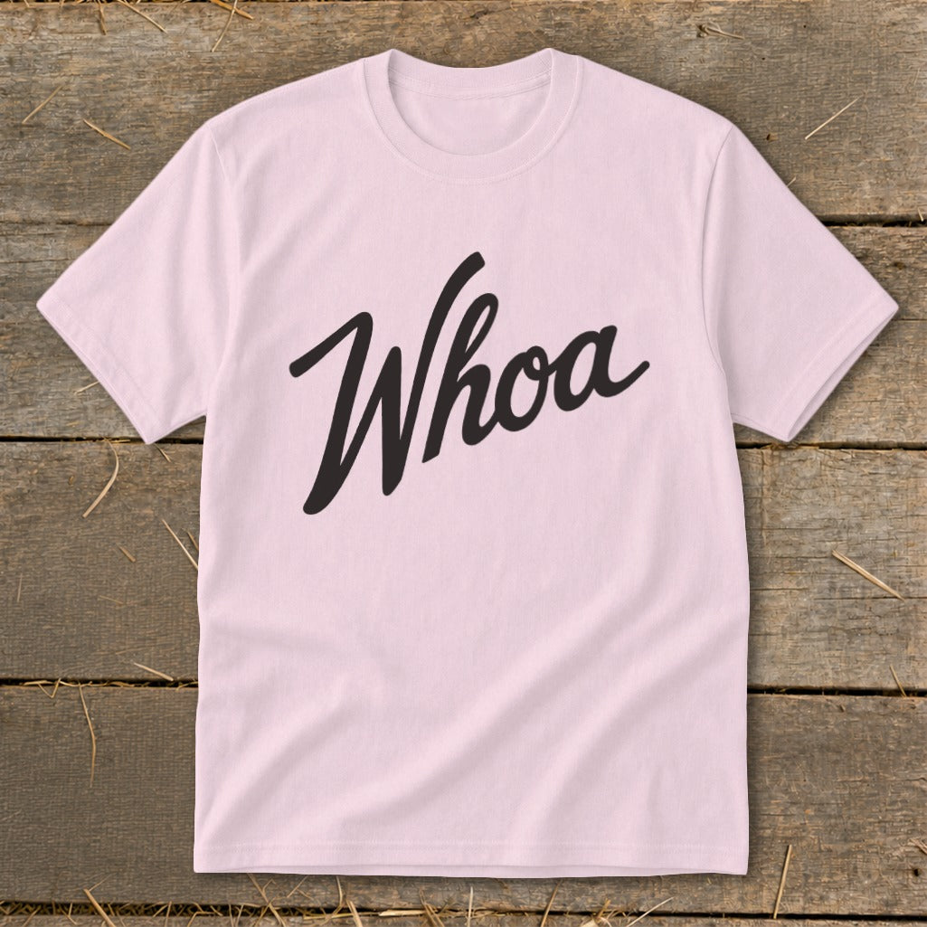 Light pink t-shirt with "Whoa" in black script lettering.