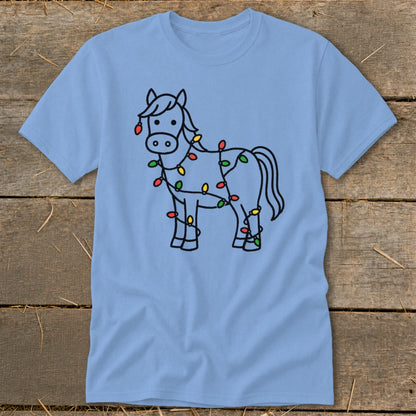Light blue t-shirt with a black line drawing of a horse covered in colorful Christmas lights.