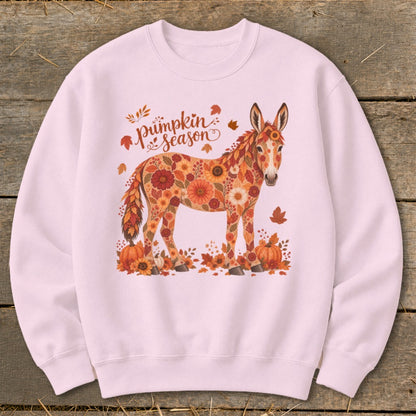 Pink sweatshirt with a floral donkey and "Pumpkin Season" text.