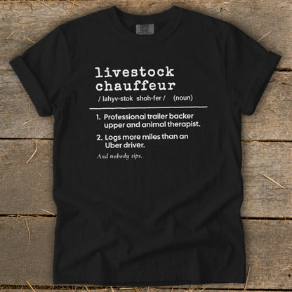 Black t-shirt with white text defining "livestock chauffeur."