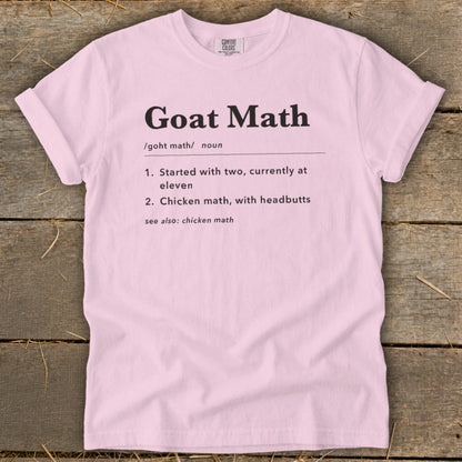 Pink t-shirt with "Goat Math" definition printed in black text.