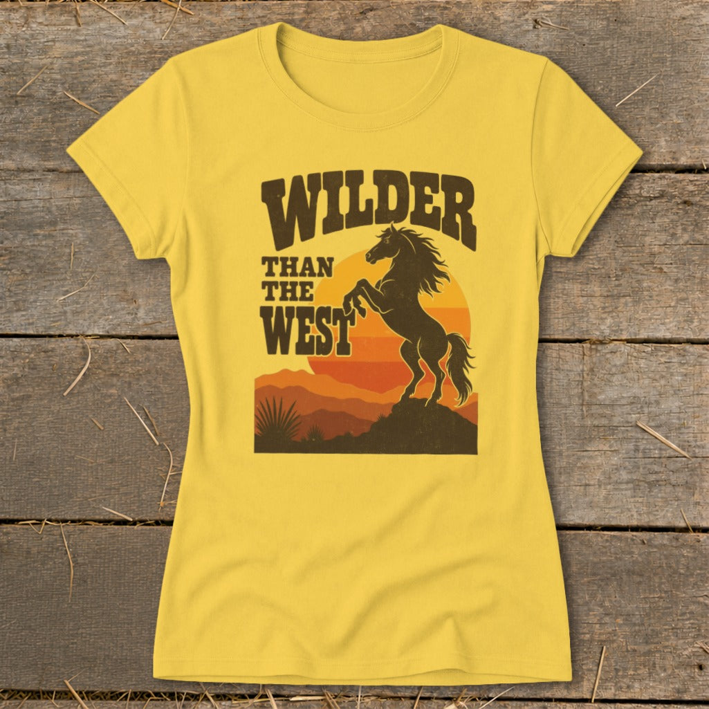 Yellow t-shirt with "WILDER THAN THE WEST" and rearing horse graphic.