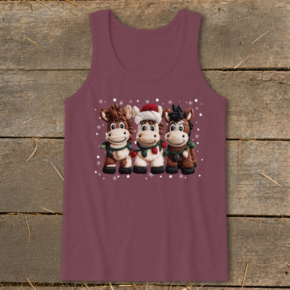 Three cartoon horses wearing Christmas decorations and a Santa hat, surrounded by snowflakes.
