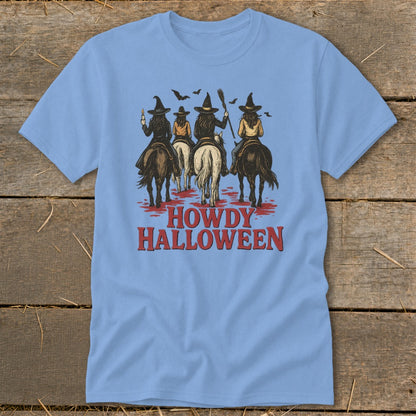 Four witches on horseback with bats above, text reads "HOWDY HALLOWEEN".
