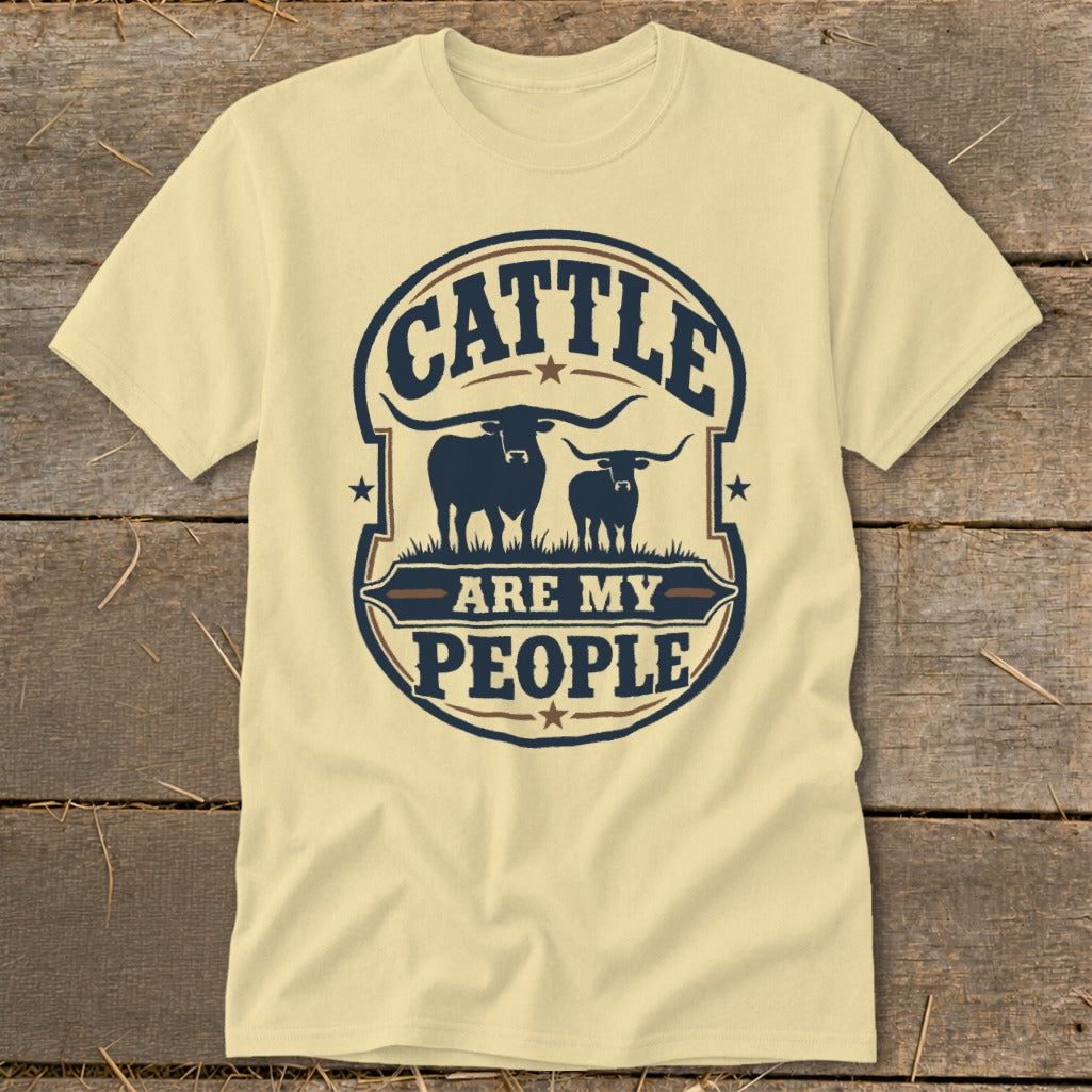 Cream t-shirt with "Cattle Are My People" text and two longhorn cattle graphics.