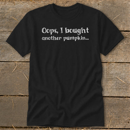 Black t-shirt with white text: "Oops, I bought another pumpkin..."