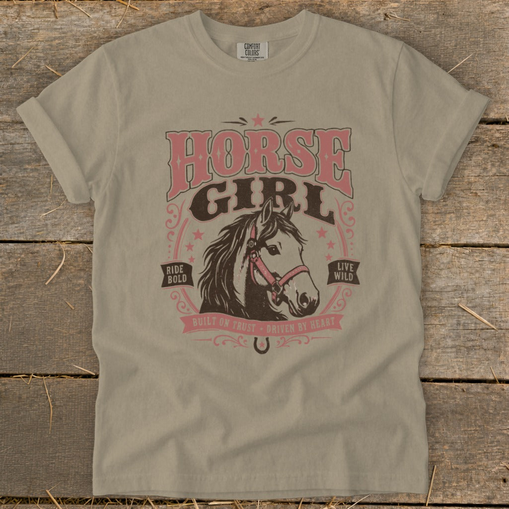 Tan t-shirt with "Horse Girl" text, horse head, and "Ride Bold Live Wild" phrases.