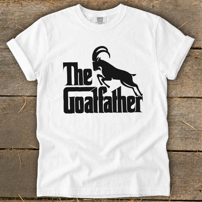White t-shirt with black text "The Goatfather" and silhouette of a goat.
