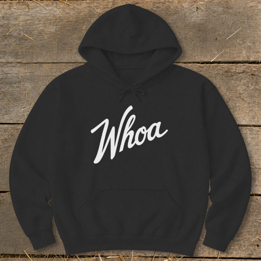 Black hoodie with white "Whoa" text on the front.