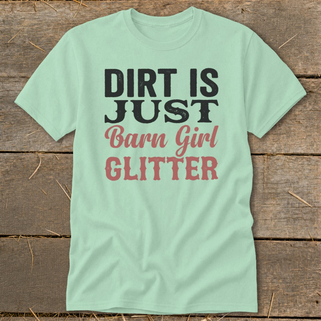 Light green t-shirt with black and pink text reading "DIRT IS JUST Barn Girl GLITTER".