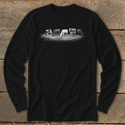 Black long-sleeve shirt with a graphic of five cows grazing in a field.
