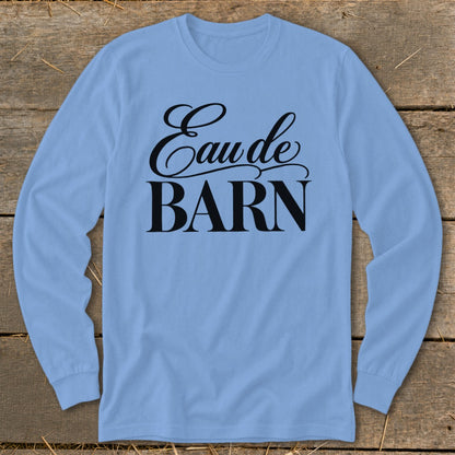 Light blue long-sleeve shirt with "Eau de BARN" text printed in black.