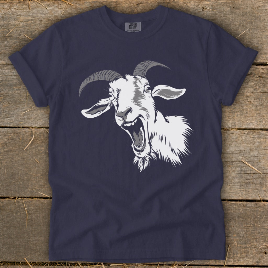 Navy t-shirt with a cartoonish white goat head design screaming.