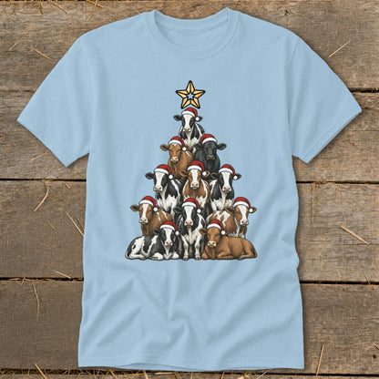 Light blue t-shirt with cows in Santa hats forming a Christmas tree shape.