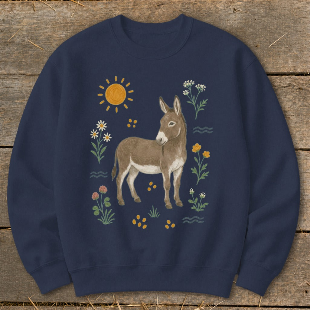 Navy sweatshirt with a watercolor-style donkey surrounded by flowers and a sun.