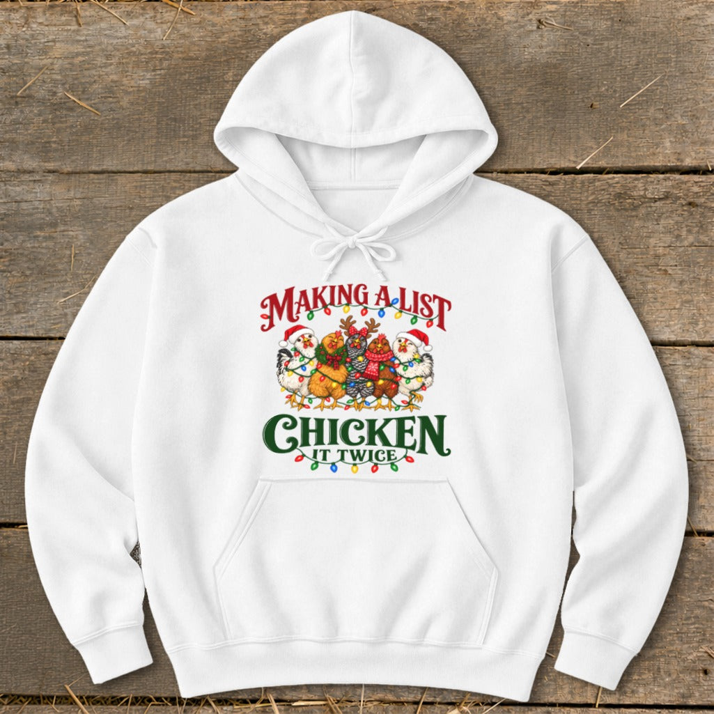 White hoodie with Christmas chickens and the text "MAKING A LIST, CHICKEN IT TWICE".
