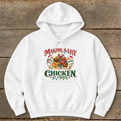 White hoodie with Christmas chickens and the text "MAKING A LIST, CHICKEN IT TWICE".