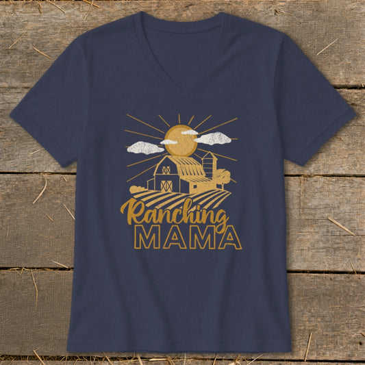 Dark blue v-neck t-shirt with graphic that says "Ranching Mama" over a barn and fields.