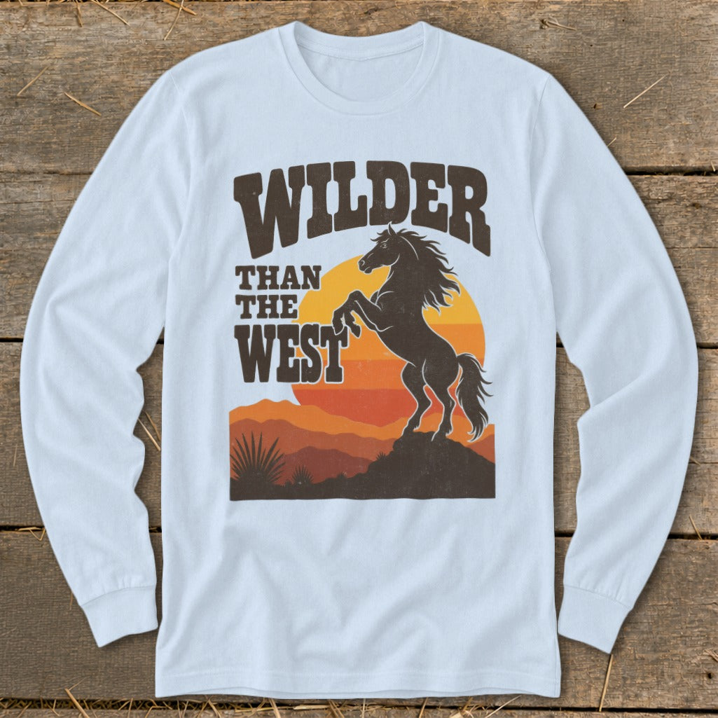 Long sleeve shirt with a graphic of a bucking horse and "Wilder Than The West" text.