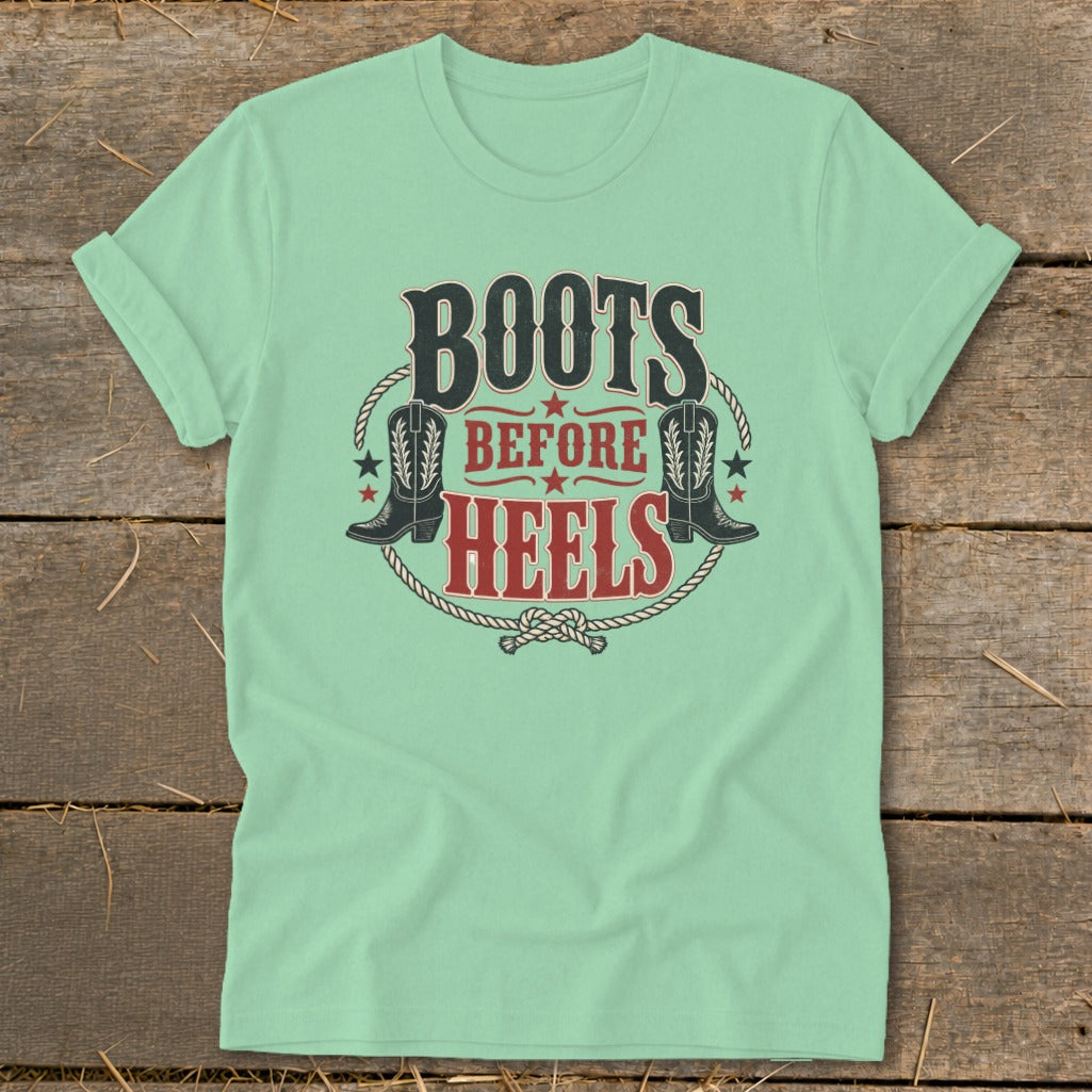 Mint t-shirt with "Boots Before Heels" text and cowboy boot graphics.
