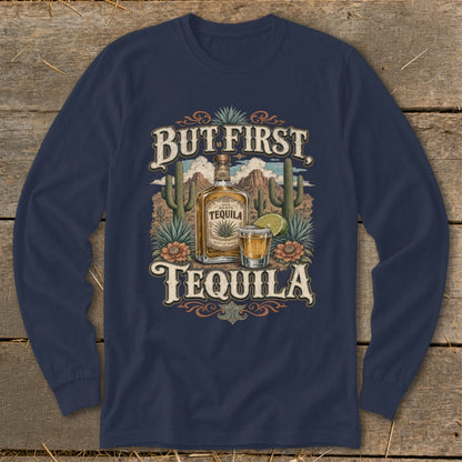Graphic with "But First Tequila" text, bottle, shot, lime, and desert landscape.