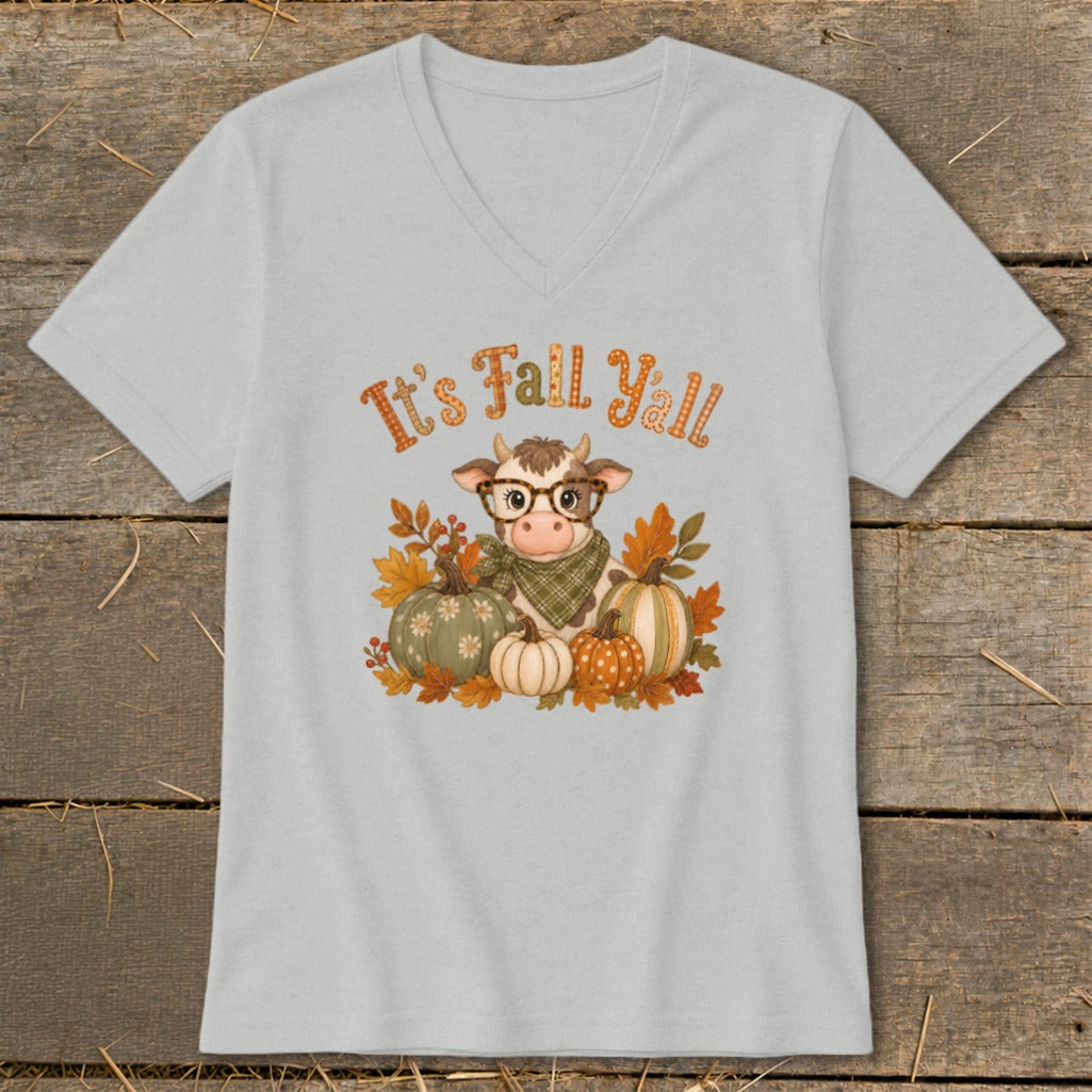 Cow with glasses and scarf surrounded by pumpkins and fall leaves, text "It's Fall Y'all".