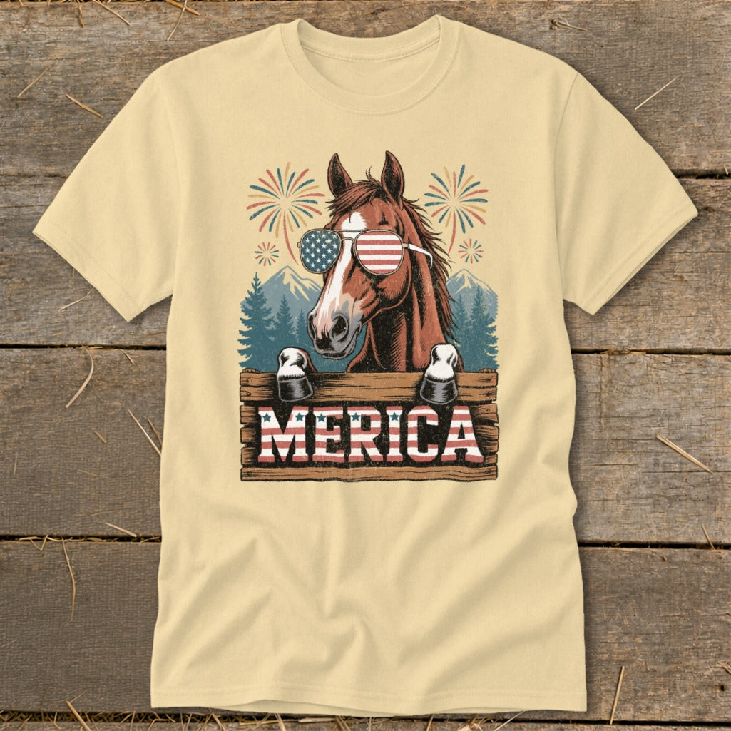 Horse wearing American flag sunglasses, fireworks, and "MERICA" sign.