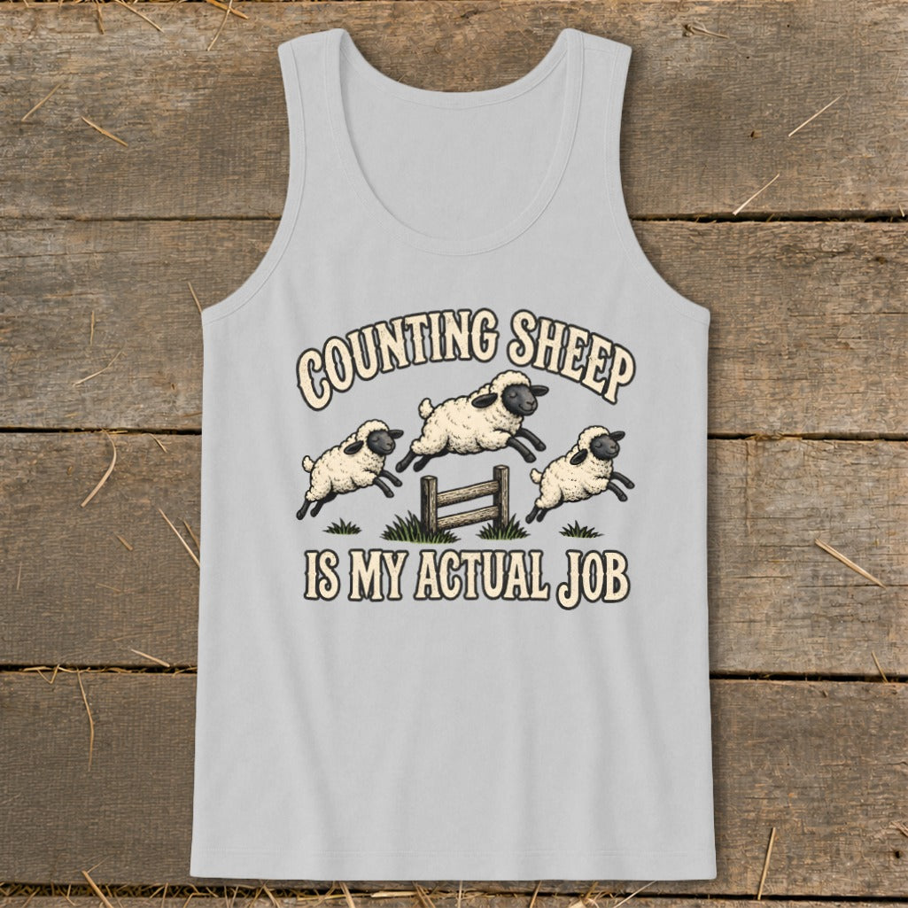 Gray tank top with "Counting Sheep Is My Actual Job" text and three jumping sheep.