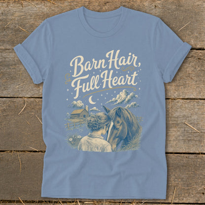 Blue t-shirt with "Barn Hair, Full Heart" text and a drawing of a woman and horse.