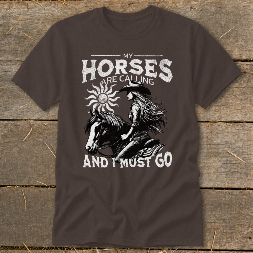 Brown t-shirt with graphic: "My horses are calling and I must go."