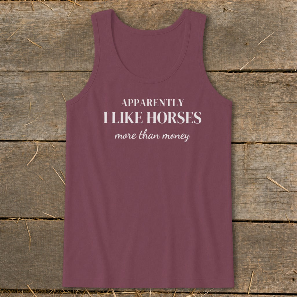 Maroon tank top with white text: "APPARENTLY I LIKE HORSES more than money."