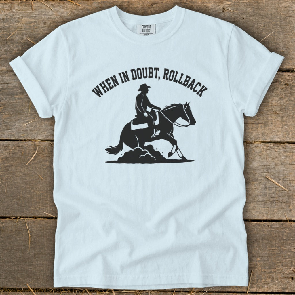White t-shirt with graphic "When in doubt, rollback" and cowboy on horse.