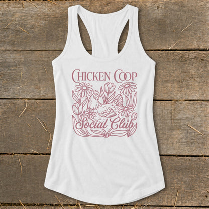 White tank top with "Chicken Coop Social Club" text and chicken with flowers graphic.