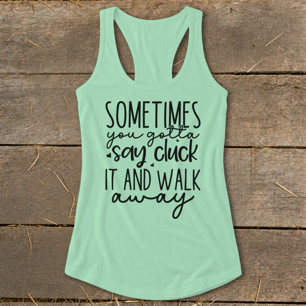 Light mint green tank top with black text reading "SOMETIMES you gotta say cluck IT AND WALK away"