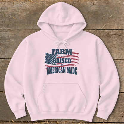 Pink hoodie with "Farm Raised American Made" text and American flag graphic.