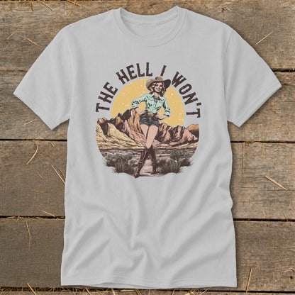 Light grey t-shirt with a distressed graphic of a cowgirl and text "THE HELL I WON'T".